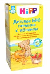 Детское питание HIPP Печенье детское HIPP c яблоком - слоник в руке ребенка