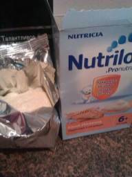 Детское питание Nutricia Быстрорастворимая молочная каша Nutrilon "Пшеница с печеньем"